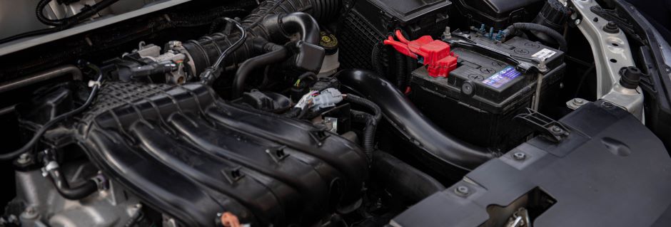 car engine displaying car battery